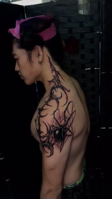 Thorns and shadow tattoo by Carlos Tattoo in Tallahassee