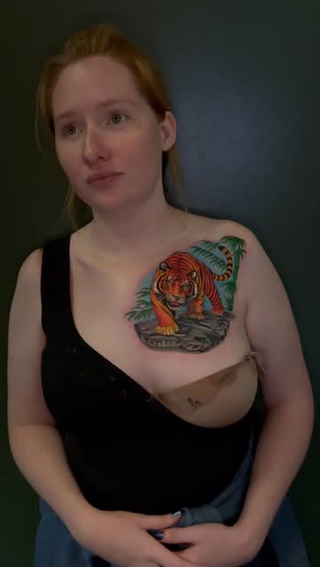 Tiger chest piece tattoo by Carlos Tattoo in Tallahassee